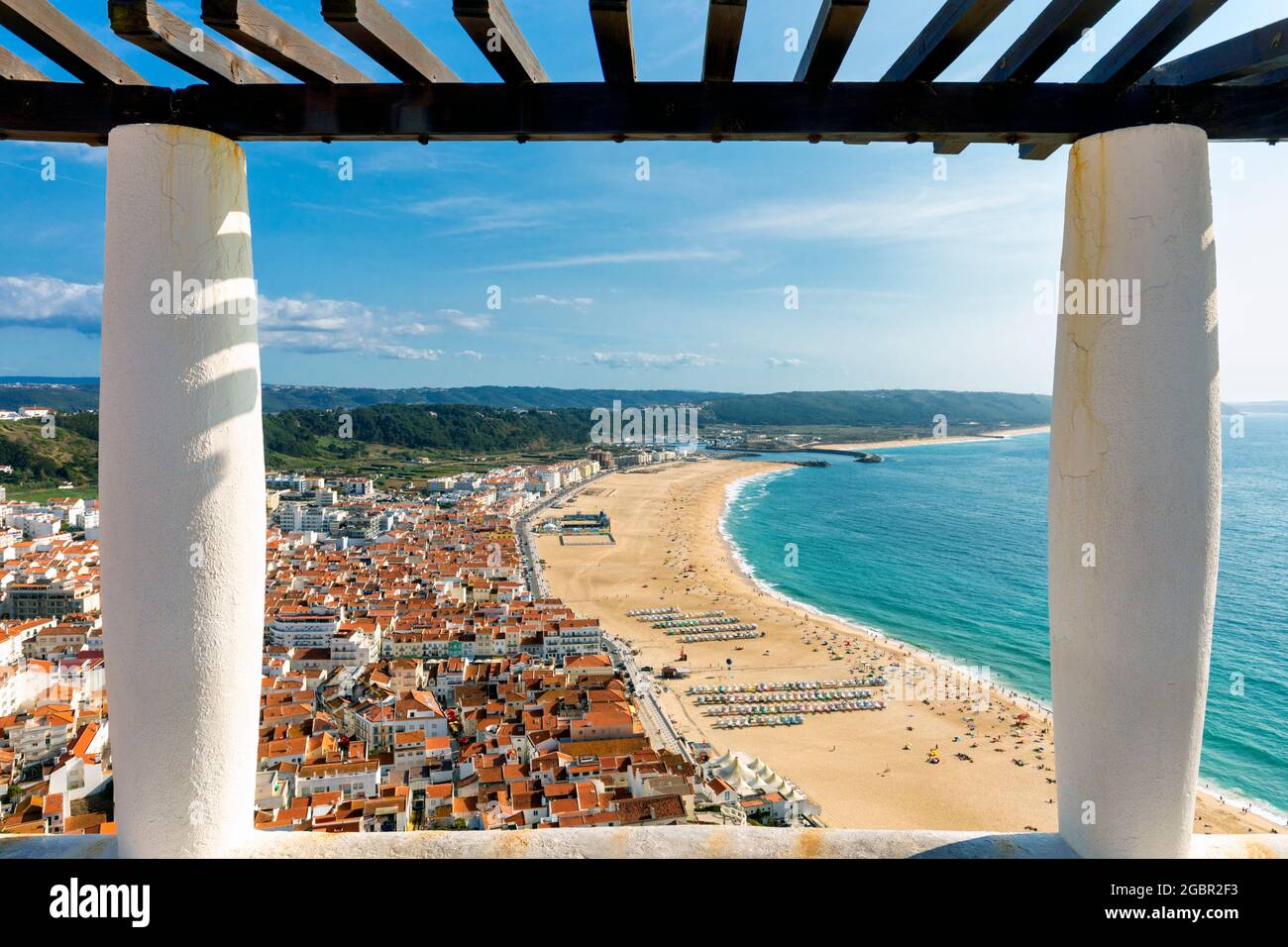 Nazare, Estremadura Province, Portugal.  The beach seen from Sitio, one of the three neighbourhoods of the town.  Sitio overlooks the main town from a Stock Photo
