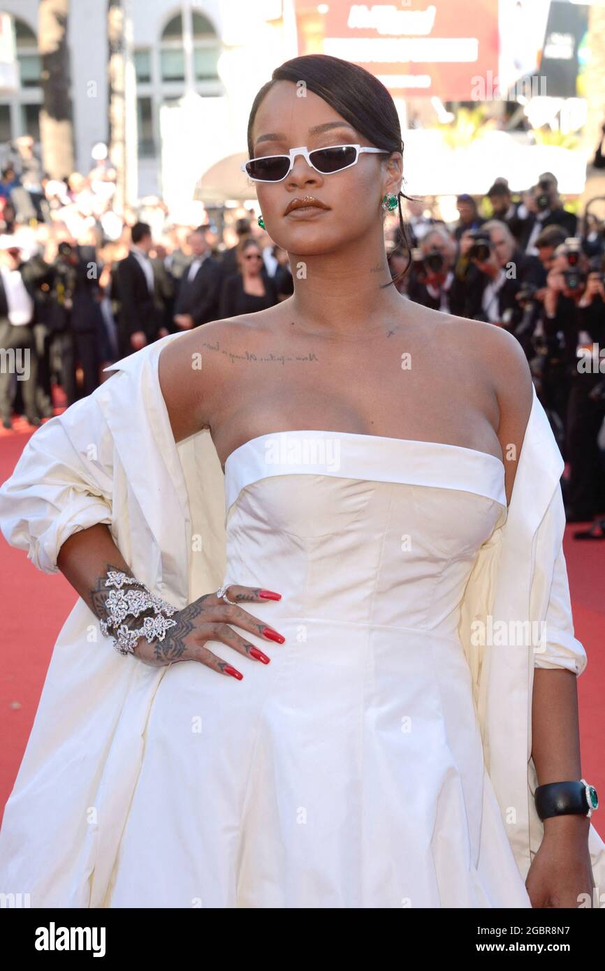 File photo dated May 19, 2017 of Rihanna attending the Okja Screening as part of the 70th Cannes Film Festival in Cannes, France. Robyn 'Rihanna' Fenty is officially a billionaire, according to Forbes. The business magazine, which tracks and publishes data on the world's wealthiest individuals, on Wednesday reported the 33-year-old pop star's estimated net worth to be $ 1.7 billion, making her the wealthiest female musician and the second-richest woman in entertainment behind Oprah Winfrey. Photo by Aurore Marechal/ABACAPRESS.COM Stock Photo