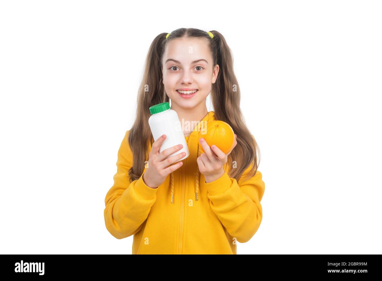 cute girl. effervescent tablet for kids. happy girl hold multivitamin