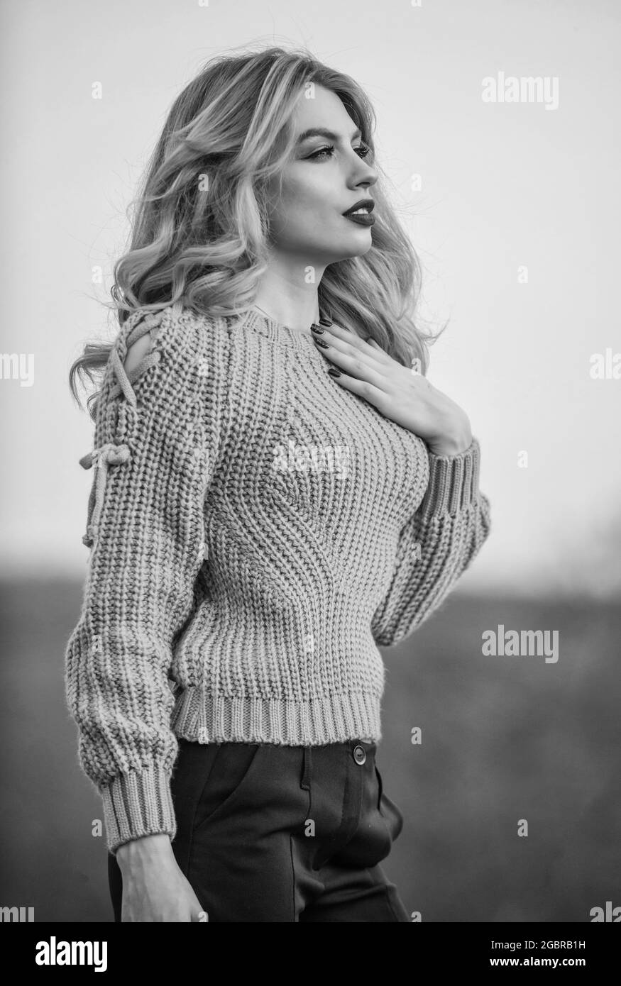 Elegance concept. Fancy girl makeup face wear knitted sweater. Style is all about balance. Gorgeous lady feeling cozy in woolen sweater. Trendy Stock Photo