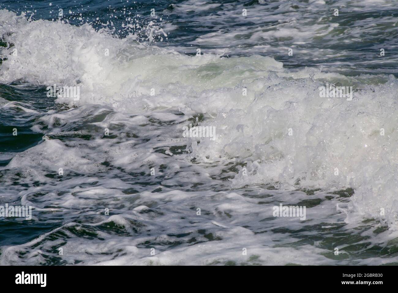 close up of white foamy sea wave Stock Photo - Alamy