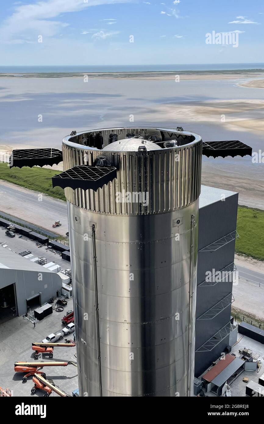 boca-chica-united-states-05th-aug-2021-spacex-ceo-elon-musk-shared-photos-show-the-companys-super-heavy-booster-4-as-it-was-rolled-out-towards-the-launch-mount-at-starbase-in-boca-chica-texas-in-preparation-for-the-companys-first-orbital-starship-launch-on-august-3-2021-photo-by-spacexupi-credit-upialamy-live-news-2GBREJ8.jpg