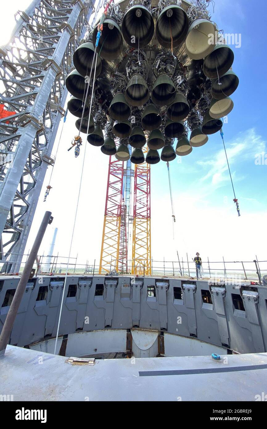 Boca Chica, United States. 05th Aug, 2021. SpaceX CEO Elon Musk shared photos show the company's Super Heavy Booster 4 as it was rolled out towards the Launch Mount at Starbase in Boca Chica, Texas, in preparation for the company's first orbital Starship launch on August 3, 2021. Photo by SpaceX/UPI Credit: UPI/Alamy Live News Stock Photo
