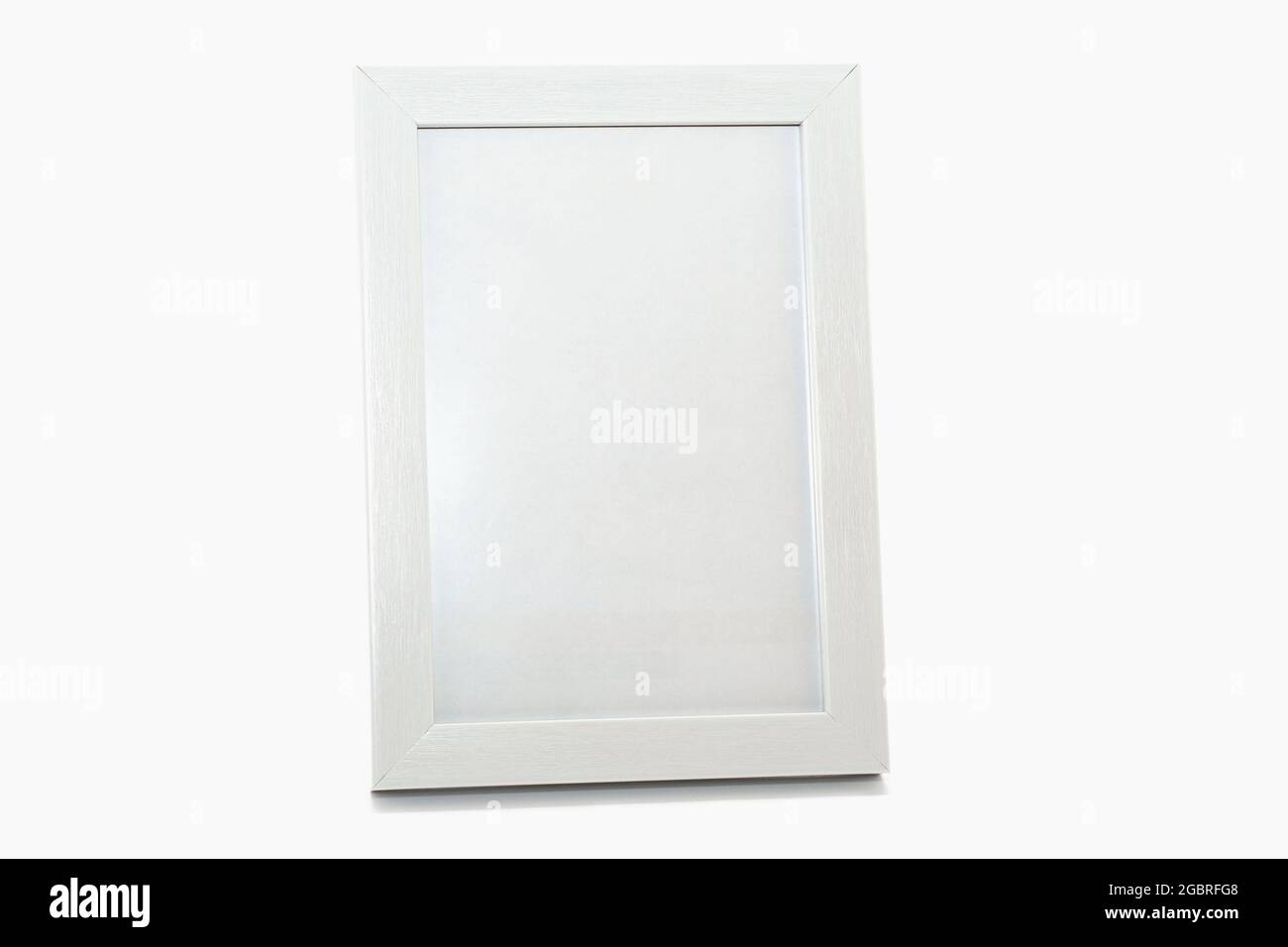 White photo frame isolated on white background. Photo frame mockup. Stock Photo