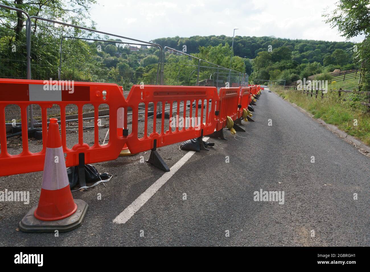 Road closure on the B5605 Newbridge Wrexham after part of the road collapsed in to the river Dee during Storm Christoph in January 2021 Stock Photo