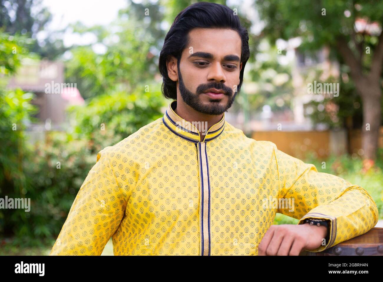Young male model in yellow kurta Stock Photo