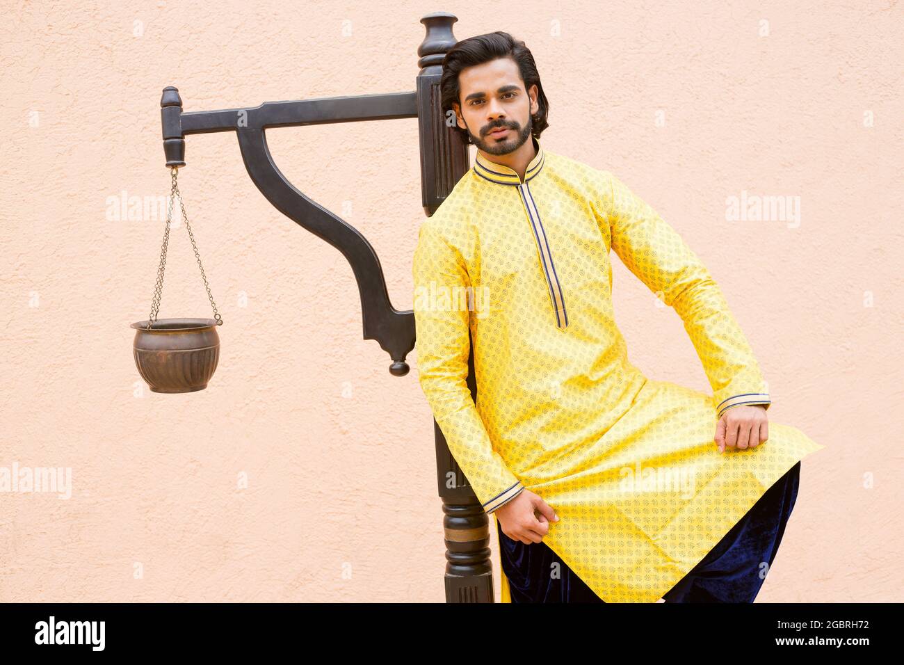 Young male model in yellow kurta Stock Photo