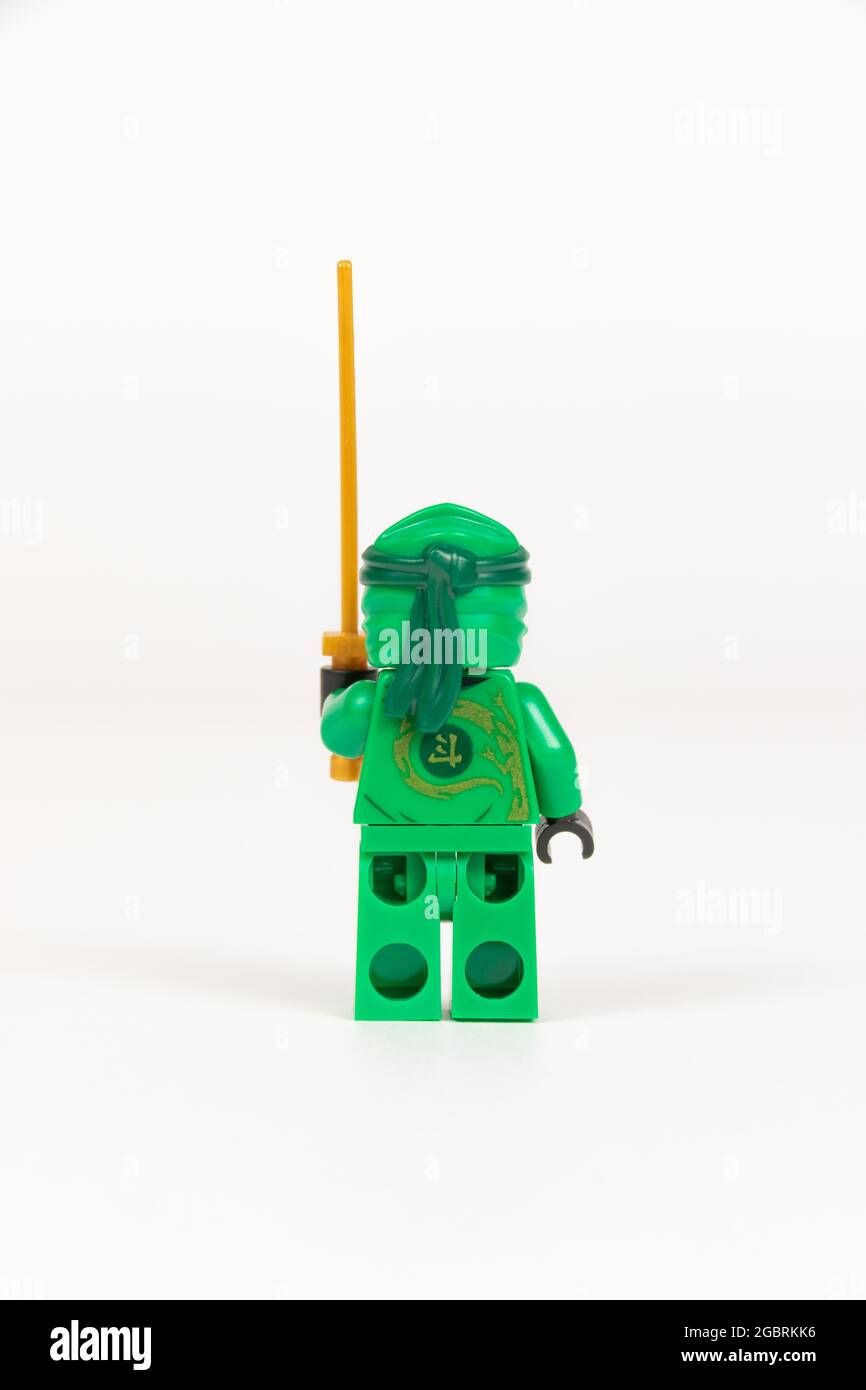 Yekaterinburg. Russia. 04.08.2021. Toy hero Lloyd in a green kimono with a  sword from a set of Lego ninjago on a white background. close-up. selective  Stock Photo - Alamy