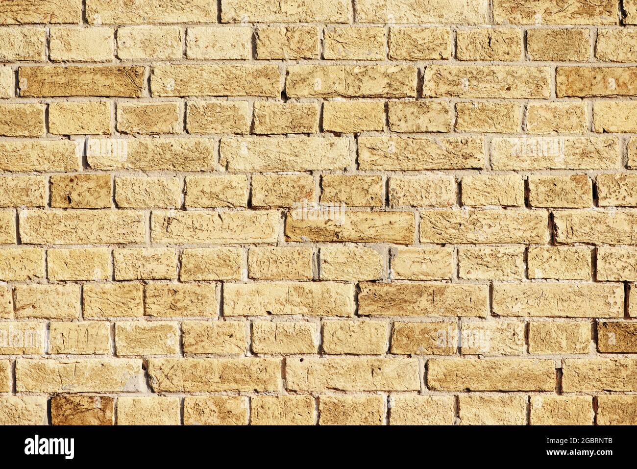 Beige brick wall. Abstract textured brick background. Space for text Stock Photo