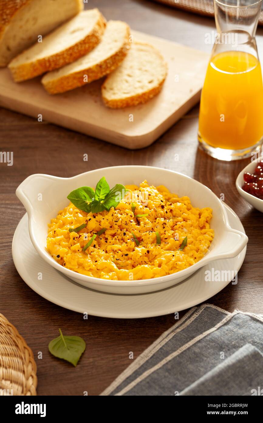 Plate of organic scrambled eggs for breakfast Stock Photo - Alamy