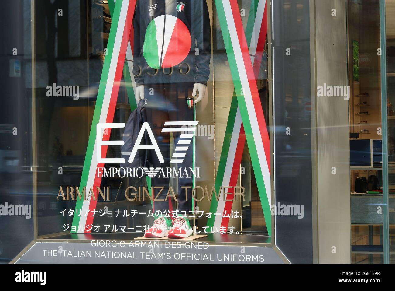 Italian Olympic team s uniform in the window of the Ginza Tower branch of Emporio Armani Stock Photo Alamy