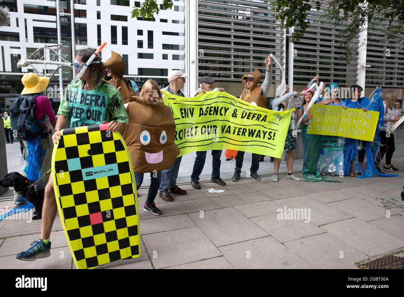 London, UK. 5th Aug, 2021. Members of Extinction Rebellion protest outside the Home Office and DEFRA. Members of Open water swimming and Angling groups protest against pollution in waterways.They want more action against global warming and the pollution of the rivers. Credit: Mark Thomas/Alamy Live News Stock Photo