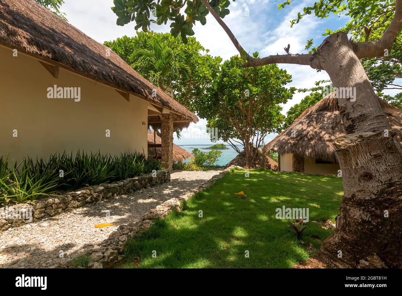 trees and room at a resort Stock Photo