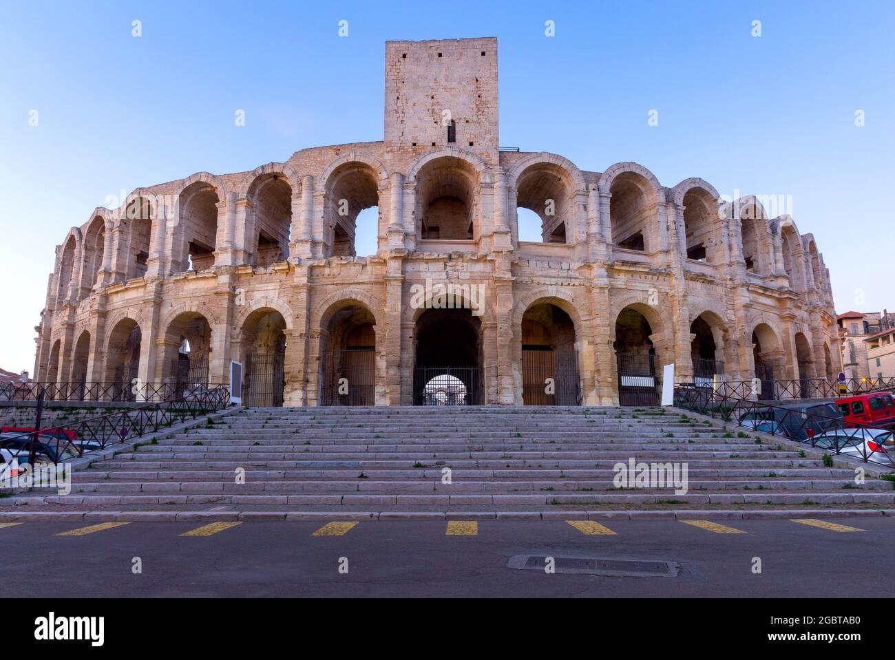 View of the old antique arena of the Roman amphitheater at dawn. Arles ...