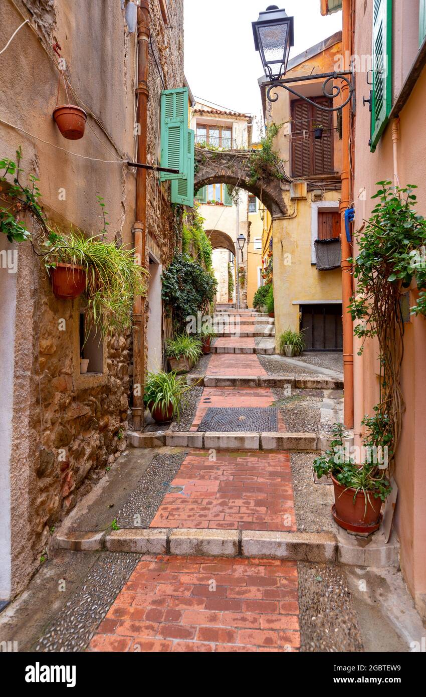 Old medieval narrow street in the historical part of the city. Menton. France. Cote d'Azur Stock
