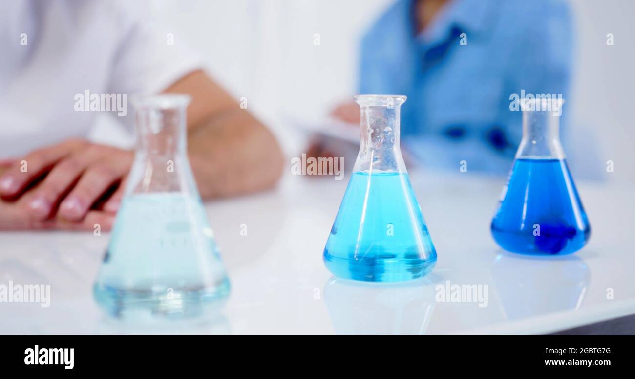 A close-up on three laboratory flask Stock Photo