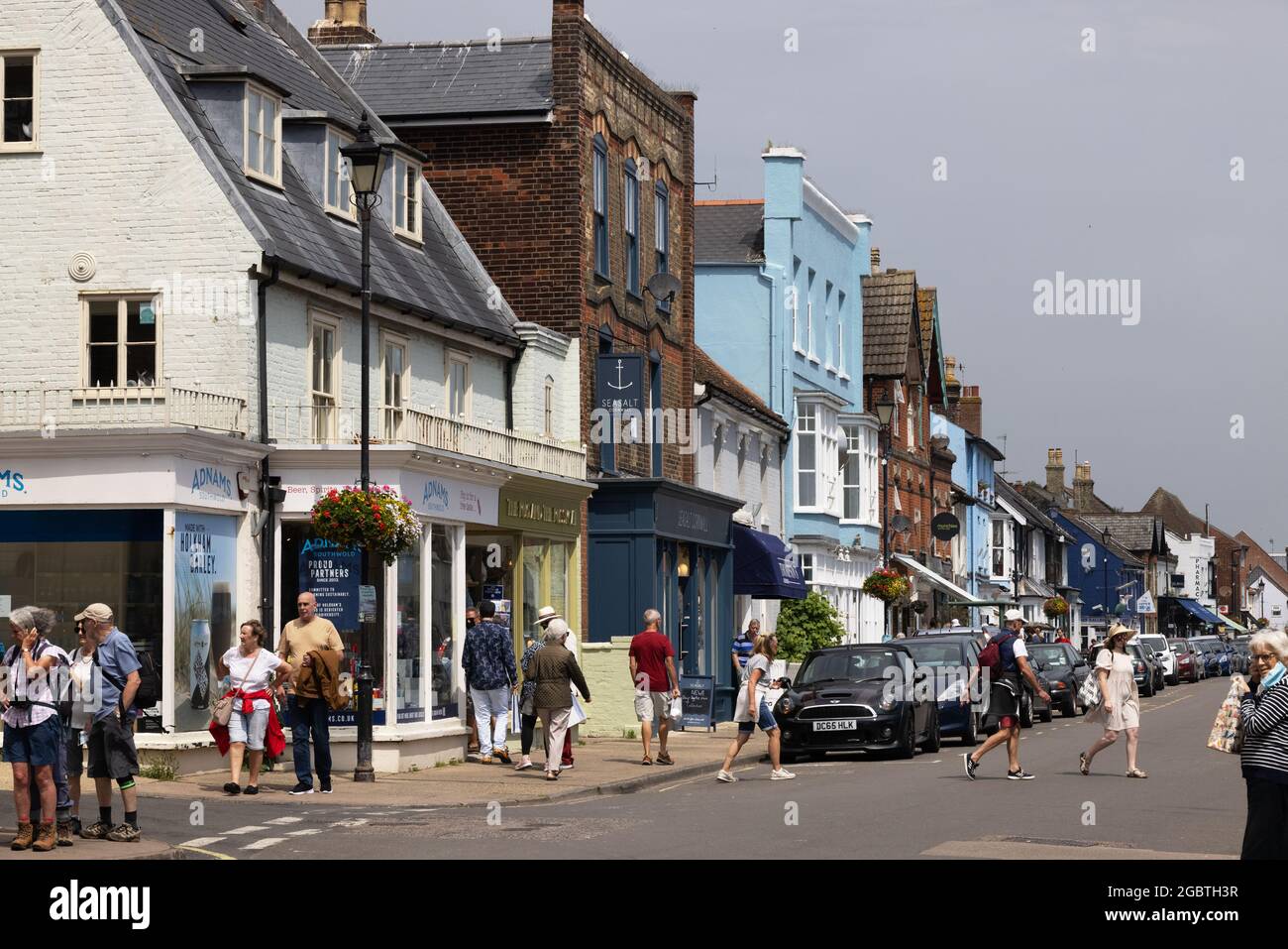 High street, Aldeburgh Suffolk UK; a busy morning in the town of Aldeburgh, Suffolk England UK Stock Photo