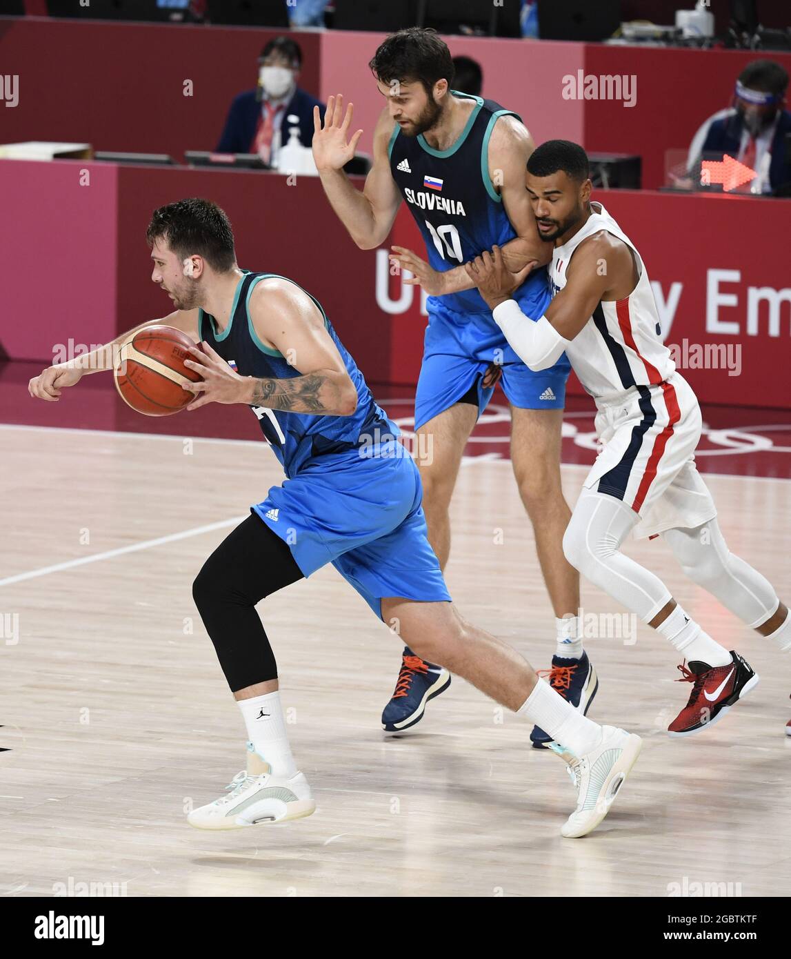 Tokyo, Japan. 05th Aug, 2021. Slovenia's Mike Tobey (10) blocks France's  Timothe Luwawu Cabarrot as Luka Doncic dribbles past during Men's Basketball  semifinal at the Tokyo 2020 Olympics, Thursday, August 5, 2021,