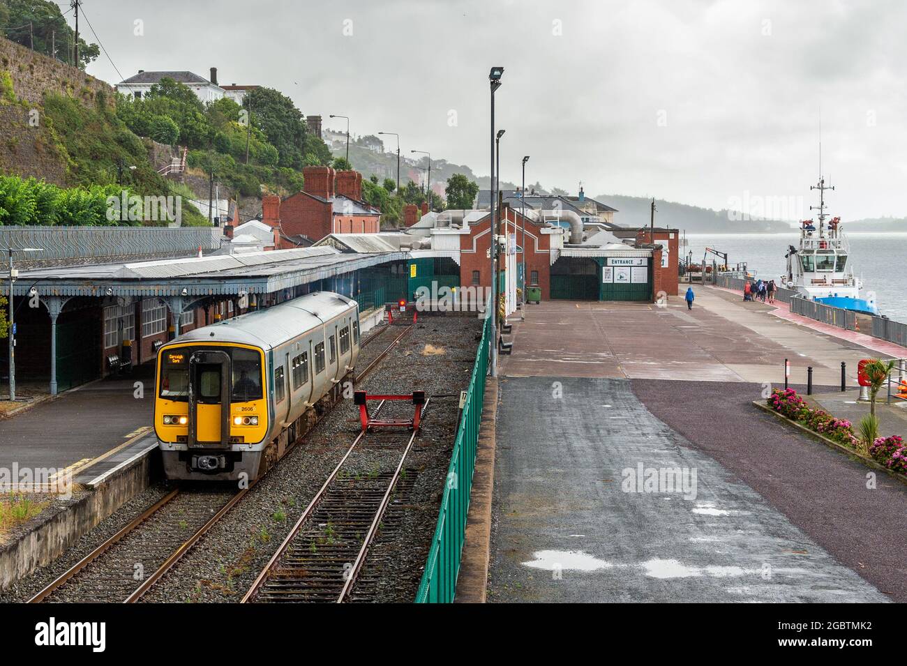 Cobh, County Cork, Ireland. 5th Aug, 2021. Met Éireann has issued a yellow weather warning for heavy rain and thunderstorms which will lead to localised flooding and hazardous driving conditions. The warning is in place until 22.00 tonight. Cobh was pictured under a drab grey sky today, with frequent heavy showers. Credit: AG News/Alamy Live News Stock Photo