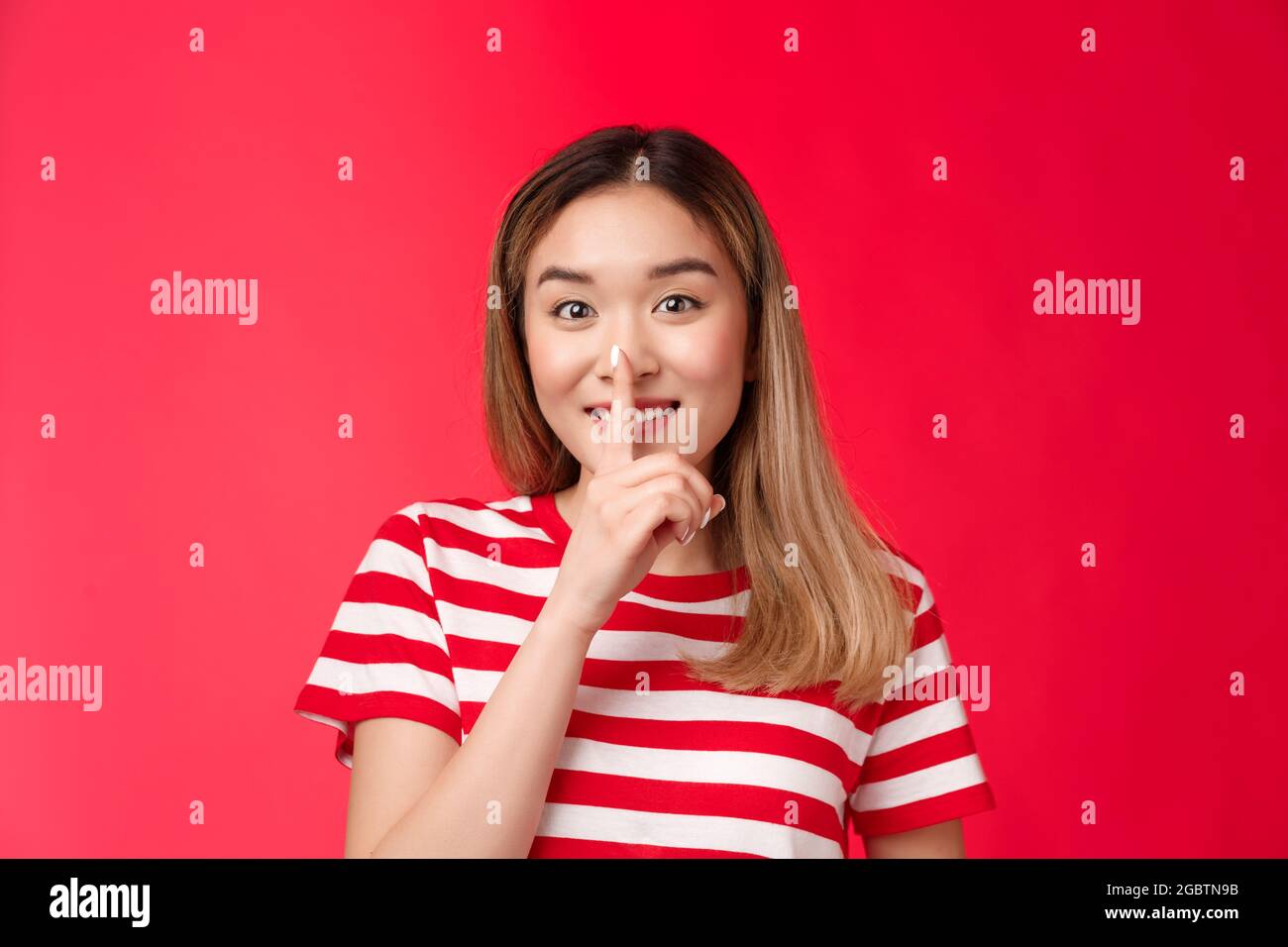 Young blond woman shushing hi-res stock photography and images - Page 2 -  Alamy