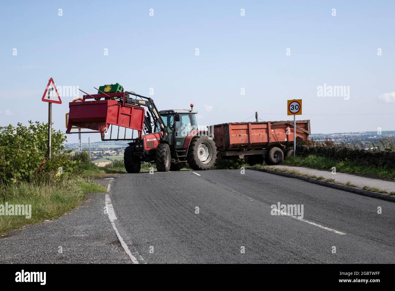 Tractor On Country Road High Resolution Stock Photography And Images Alamy