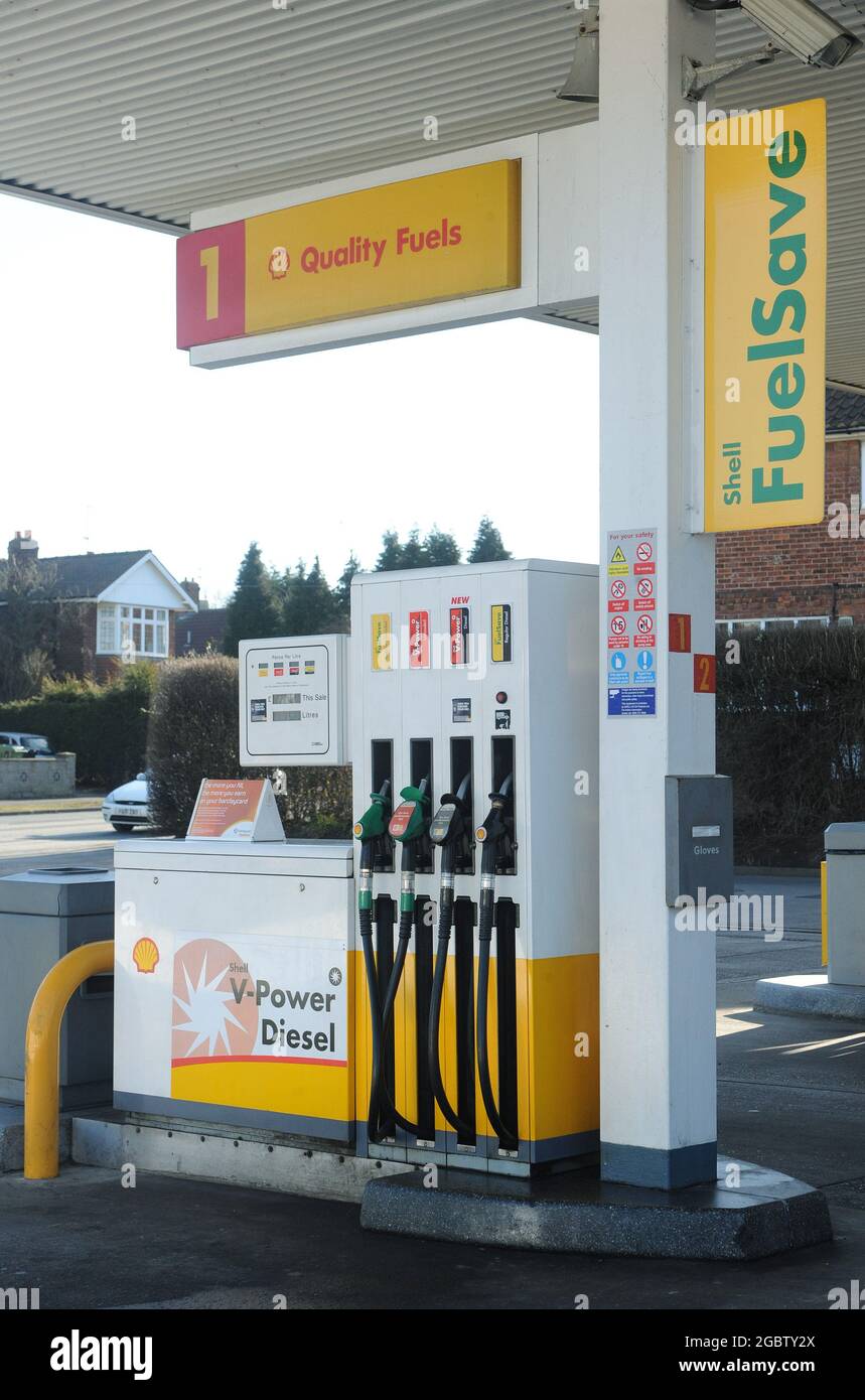 File photo dated 3/2/2011 of petrol pumps at a Shell petrol station. Drivers faced continued price increases after another 3.4p and 2.7p were added to a litre of petrol and diesel respectively during July. The month saw the largest increase in the price of unleaded since January, putting the average price of a litre of fuel at 135.13p - a price not seen since late September 2013. Stock Photo