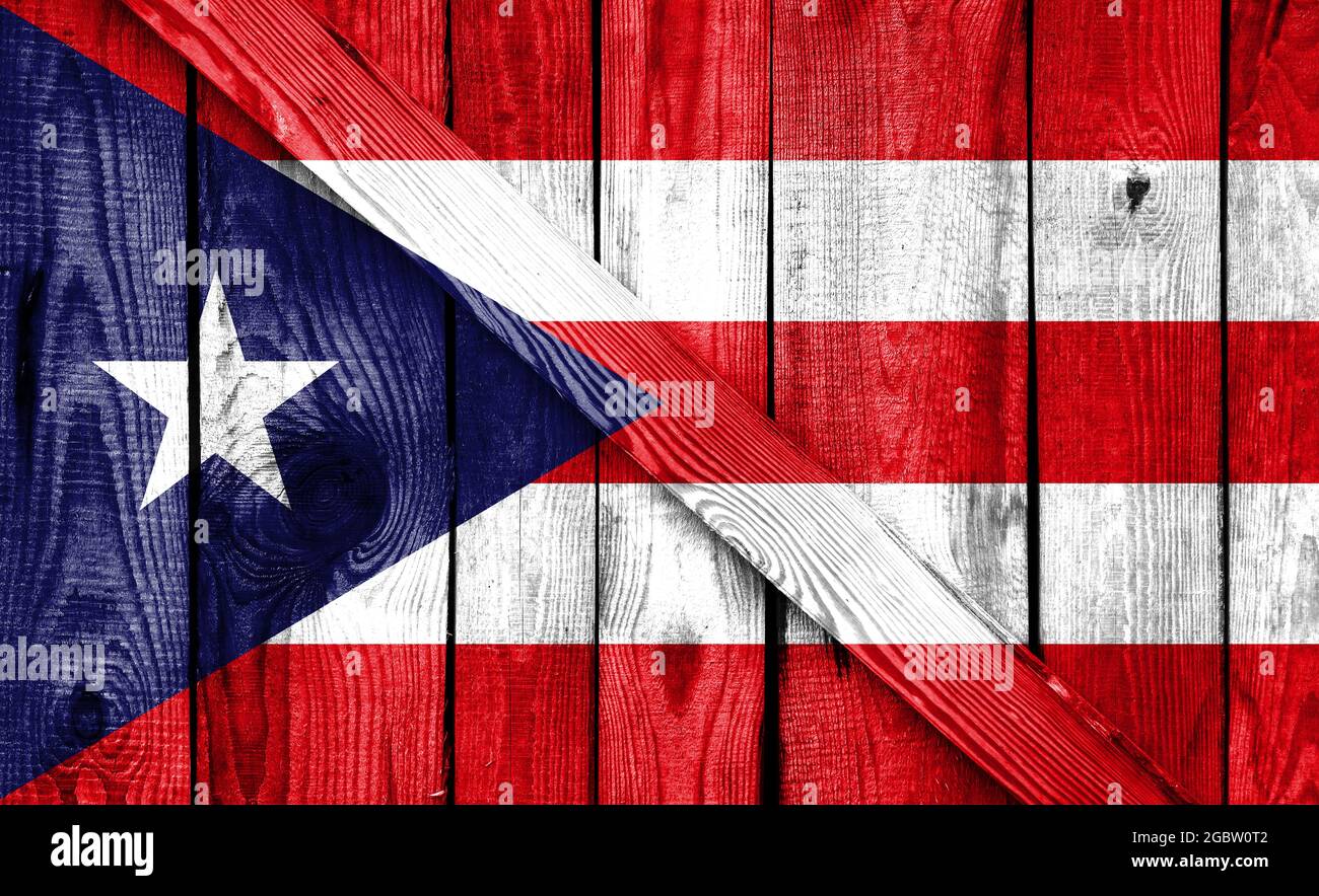 Puerto Rico flag is depicted on a wooden background close-up Stock ...