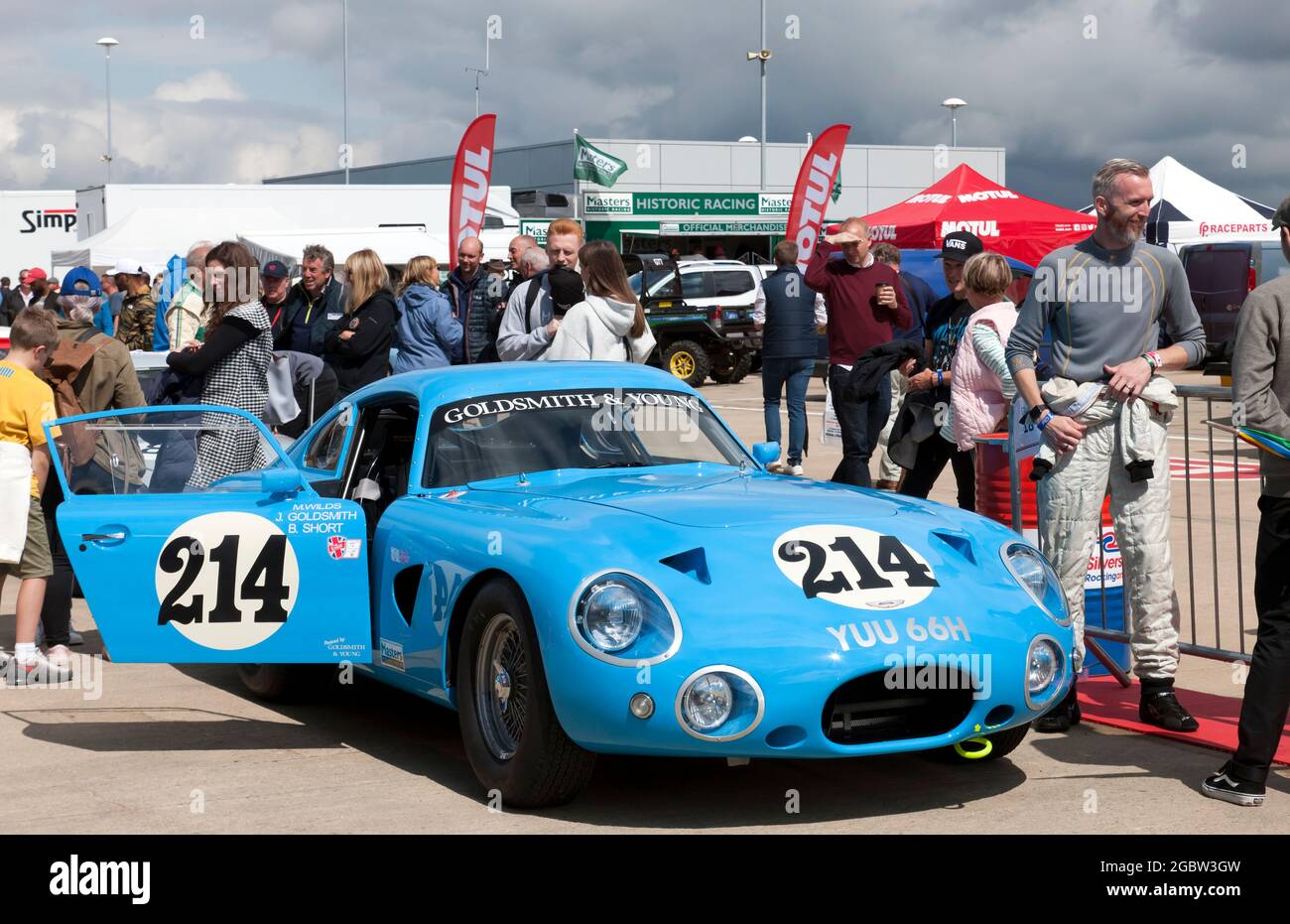 John Goldsmiths Blue Aston Martin DP214, in the International Paddock  awaiting the start of the International Trophy For Classic Pre-66 GT Cars race Stock Photo