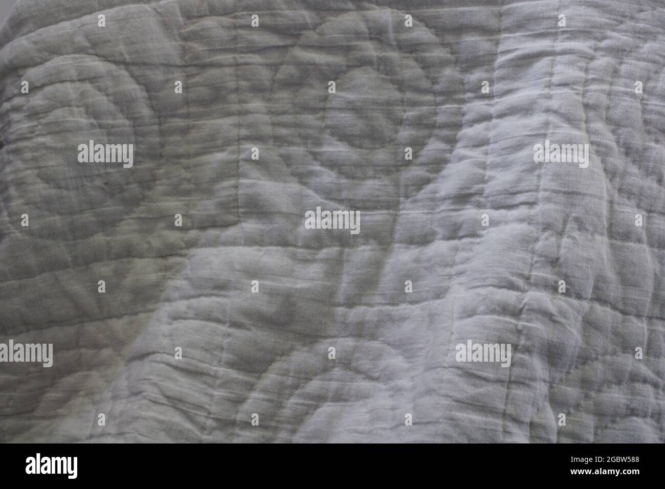 The Back of a Plain White Quilt Fabric Stock Photo Alamy