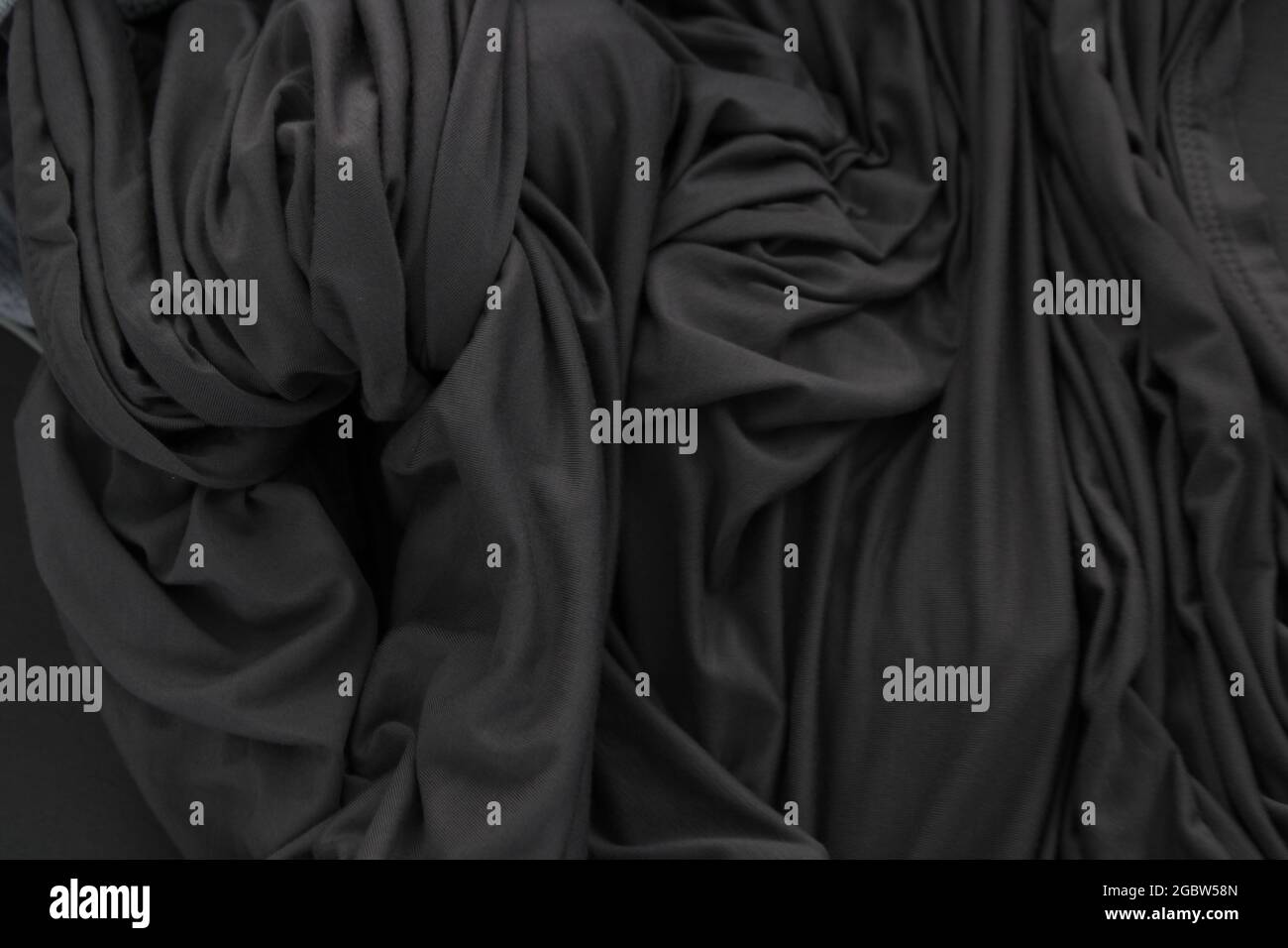 A Bunched Dark Gray Sheet Stock Photo