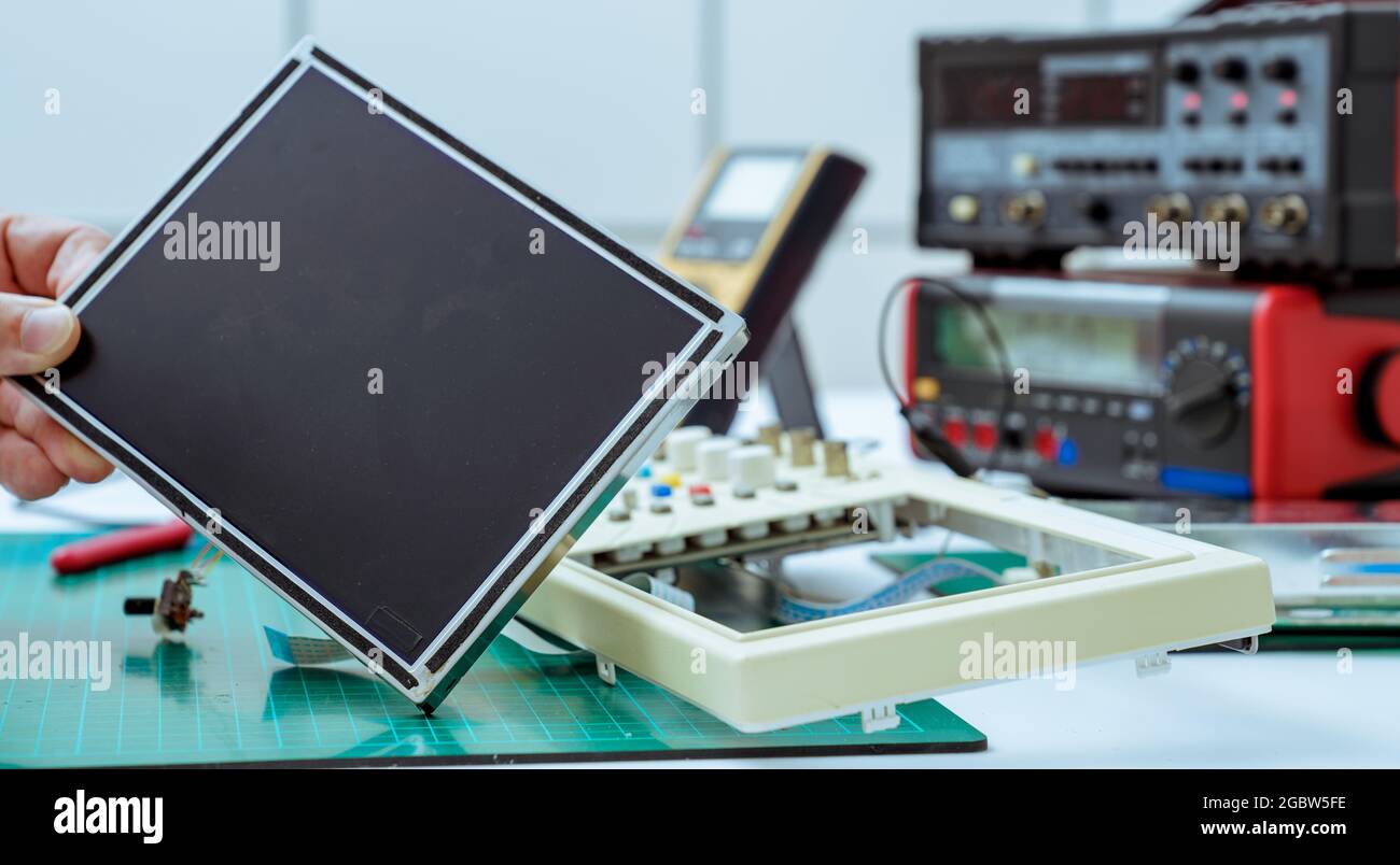 Repair of computer parts in a customer service laboratory Stock Photo