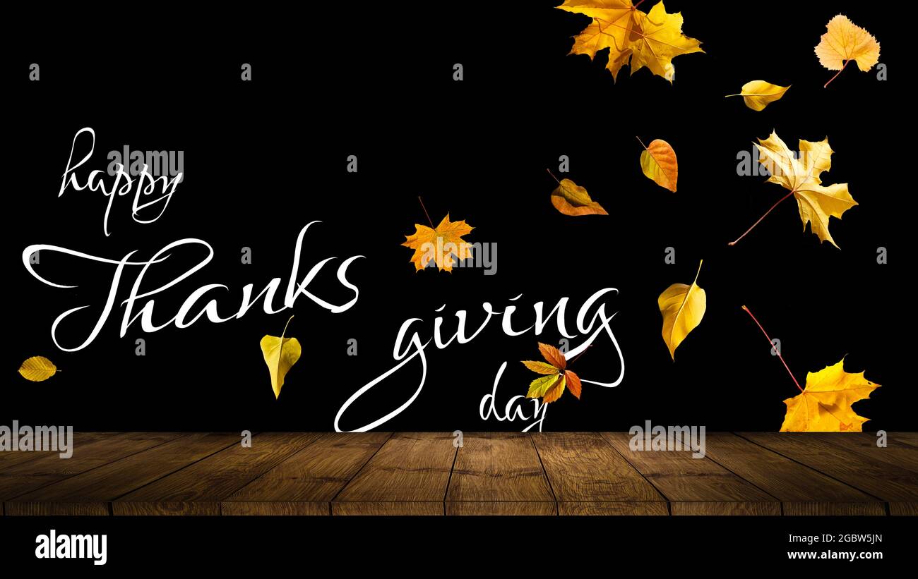 Happy Thanksgiving text with leaves over dark wood background Stock ...