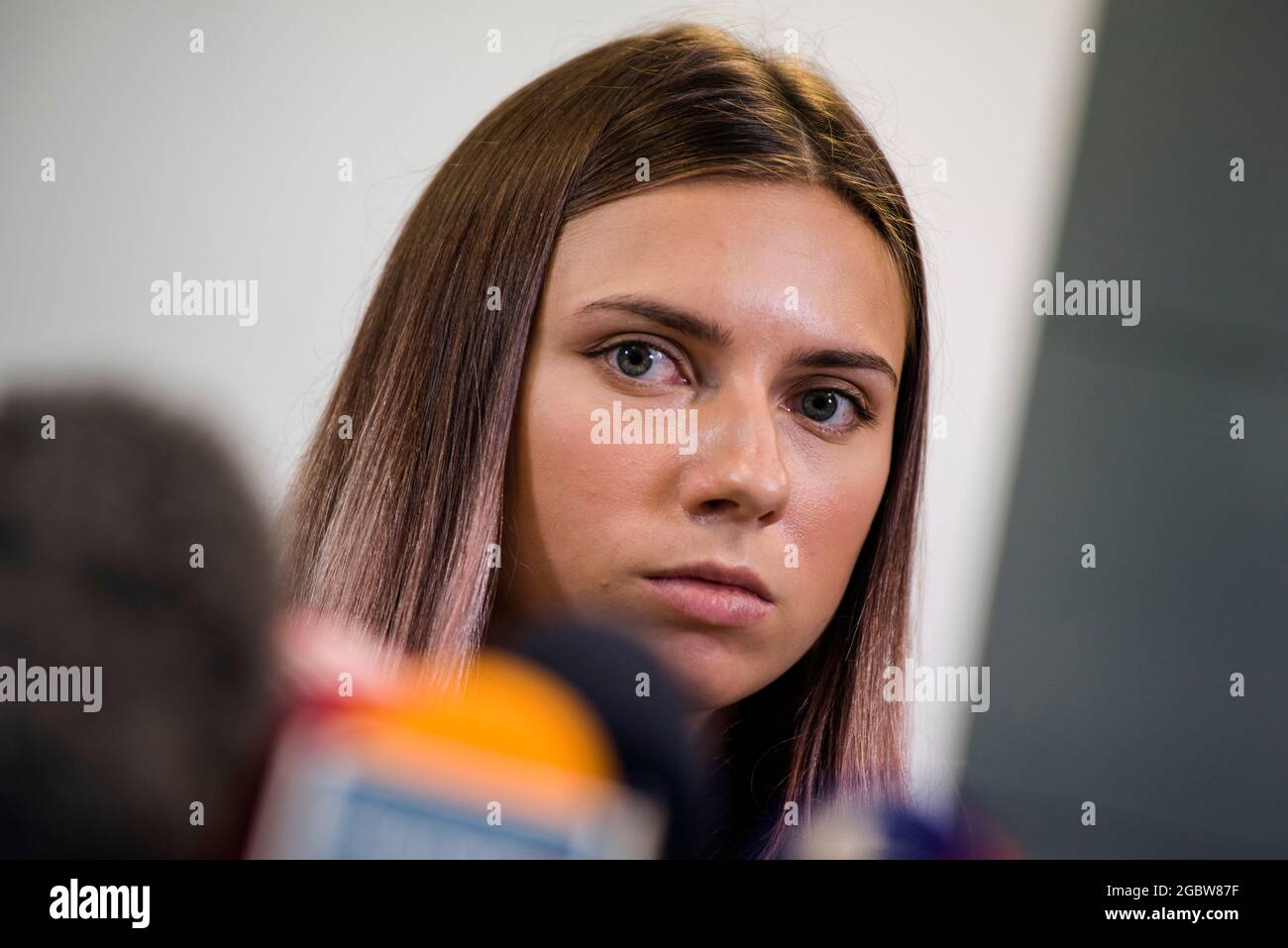 Krystsina during a press conference.Krystsina Tsimanouskaya is a ...