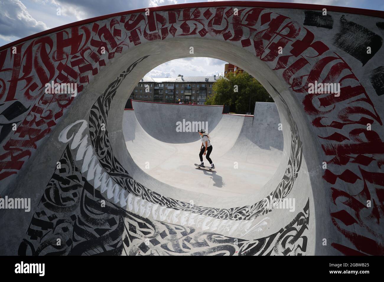 Ivanovo, Russia. 5th Aug, 2021. A woman practises skateboarding in a new  skate park opened at the Palace of Team Sports to mark Ivanovo's City Day.  The whole recreation area also including