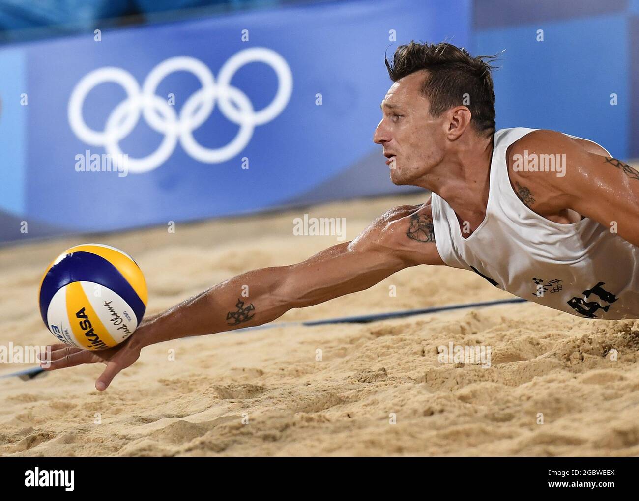 Tokyo, Japan. 5th Aug, 2021. Latvia's Martins Plavins competes during the men's beach volleyball semifinal between Anders Berntsen Mol/Christian Sandlie Sorum of Norway and Martins Plavins/Edgars Tocs of Latvia at the Tokyo 2020 Olympic Games in Tokyo, Japan, Aug. 5, 2021. Credit: Li He/Xinhua/Alamy Live News Stock Photo