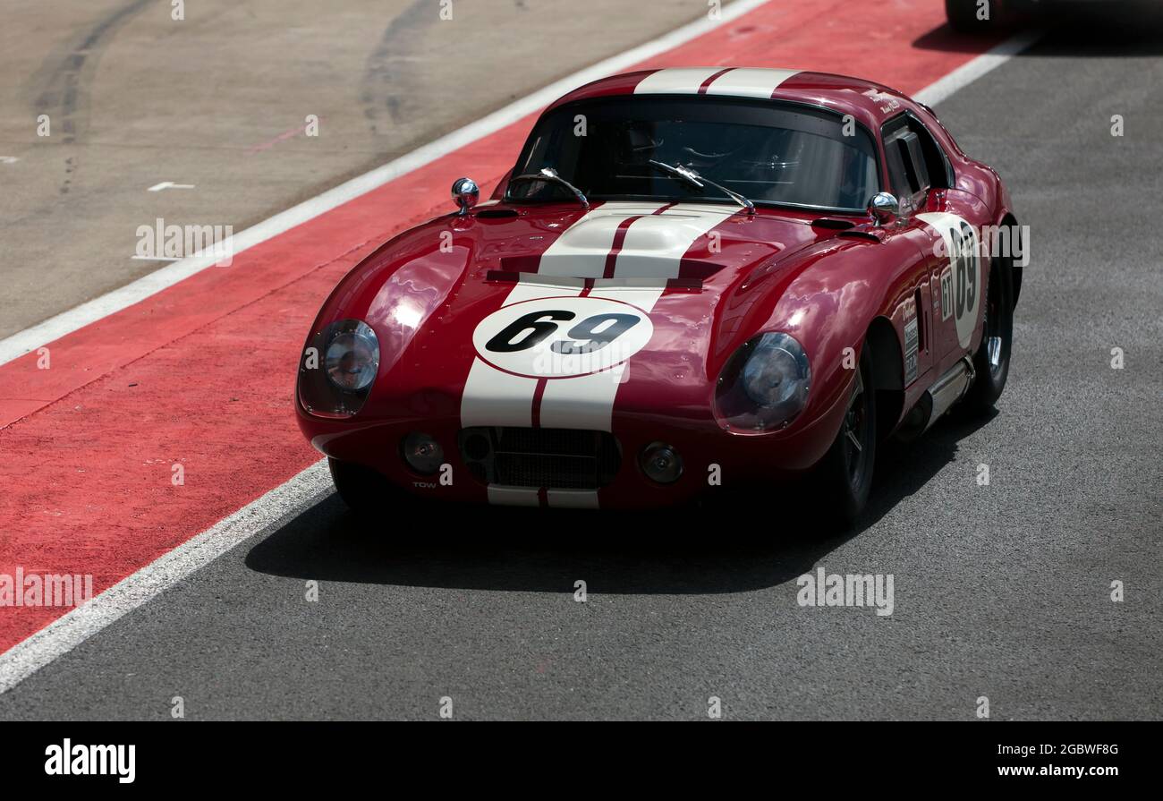 Michael Cullen's AC Cobra Daytona Coupe in the pit lane before the start of the International Trophy For Classic Pre-66 GT Cars Stock Photo