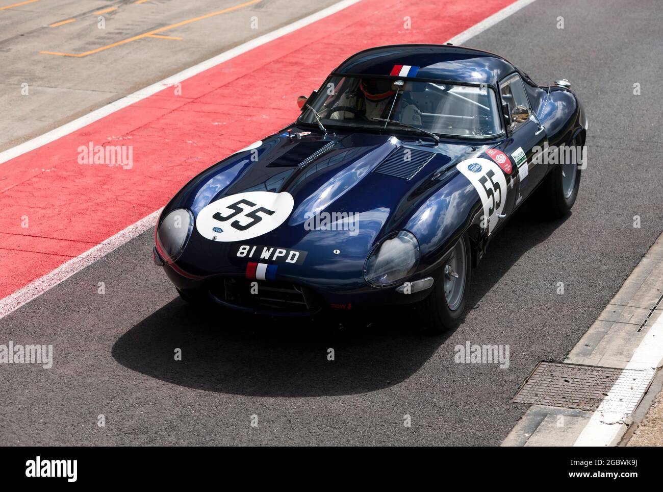 The Jaguar E-type of Martin Melling and Jason Minshaw, in the pit lane before the start of the International Trophy For Classic Pre-66 GT Cars Stock Photo