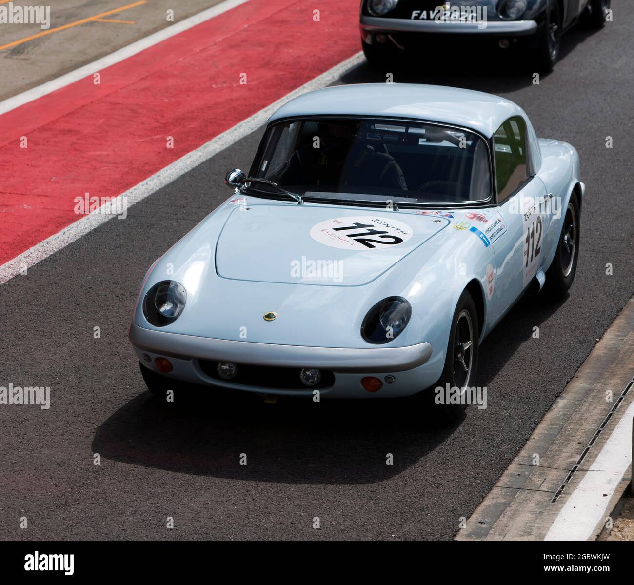 The Lotus Elan 26R of Goncalo Gomes and James Claridge in the pit lane before the start of the International Trophy For Classic Pre-66 GT Cars Stock Photo