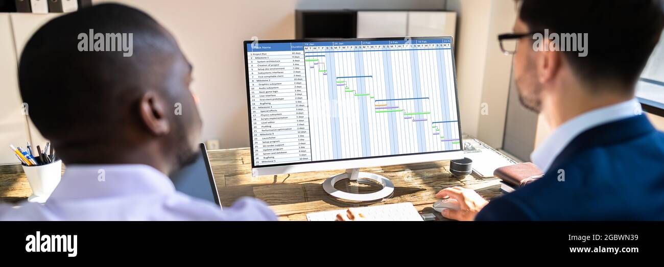Digital Gantt Chart On Computer Screen In Office Stock Photo