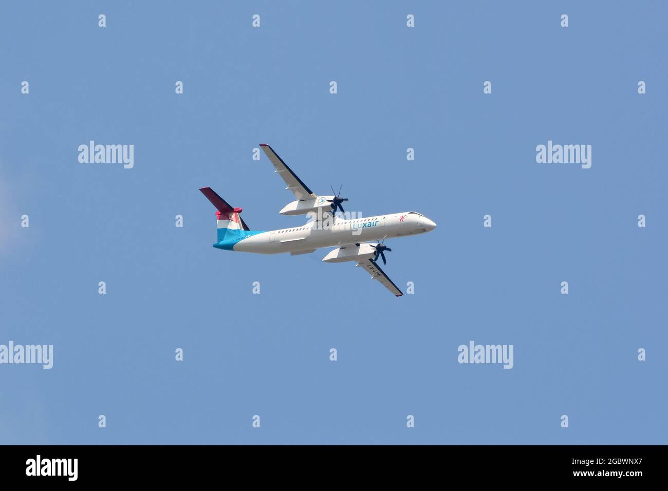 Luxair (is the flag carrier airline of Luxembourg), De Havilland Canada Dash 8-400 airplane (turboprop-powered) Stock Photo