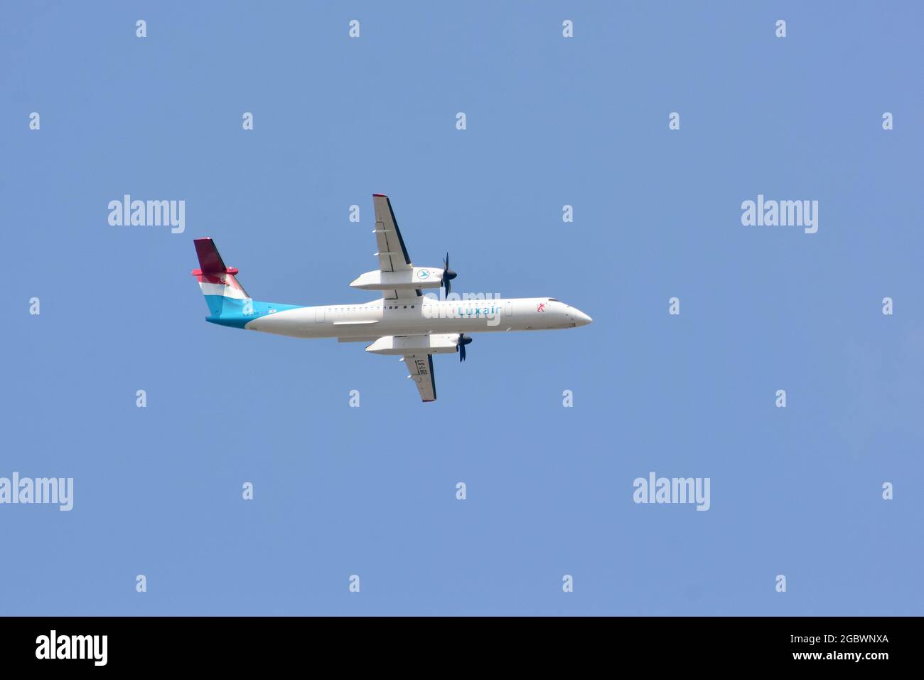 Luxair (is the flag carrier airline of Luxembourg), De Havilland Canada Dash 8-400 airplane (turboprop-powered) Stock Photo