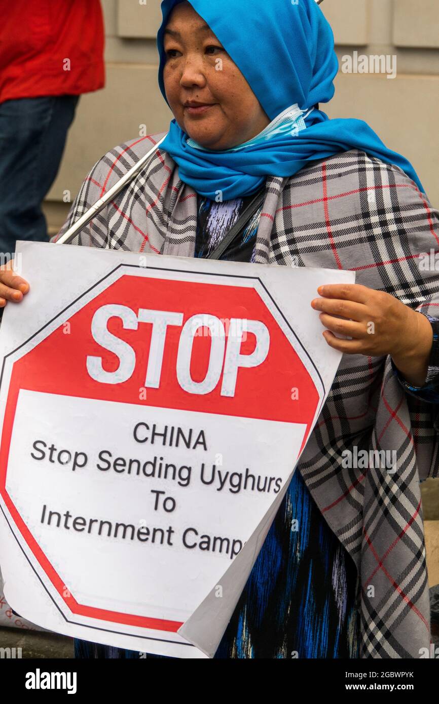 London, U.K. 5th August, 2021. Stop Uyghur Genocide protest outside Chinese Embassy. Protesting against human rights violations by the People’s Republic of China. Stock Photo