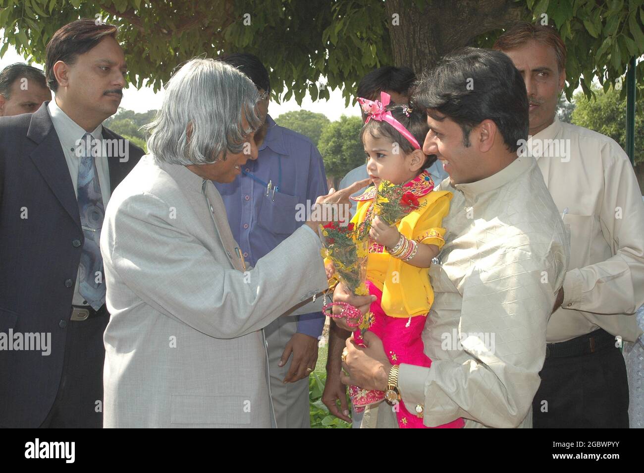 Indian President A.P.J. Abdul Kalam also known as the 'missile man' interacts with a child in Rashtrapati Bhawan (Presidential Palace) in New Delhi. P Stock Photo