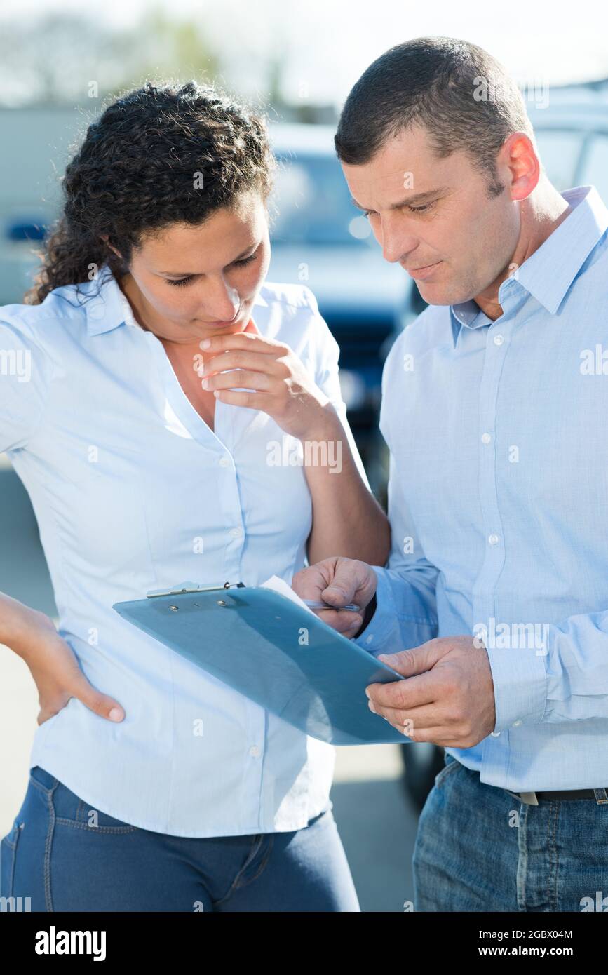 Woman man clipboard outdoors hi-res stock photography and images - Alamy