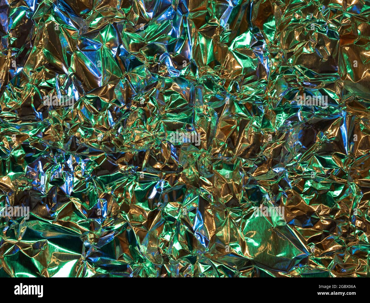 Closeup of abstract colorful crinkly shiny material Stock Photo