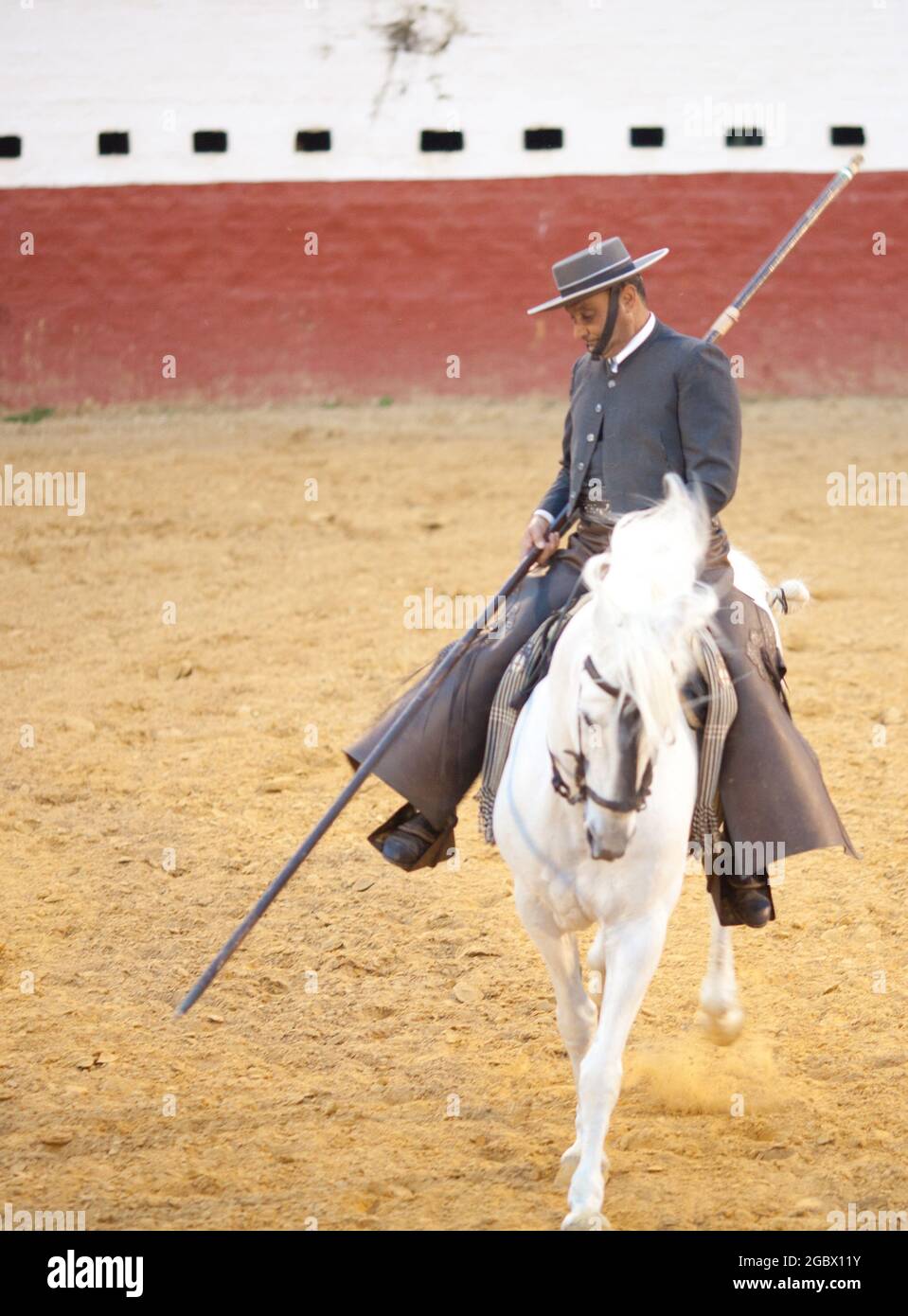Garrocha pole horse riding in Spain near Sevilla in a farm Stock Photo
