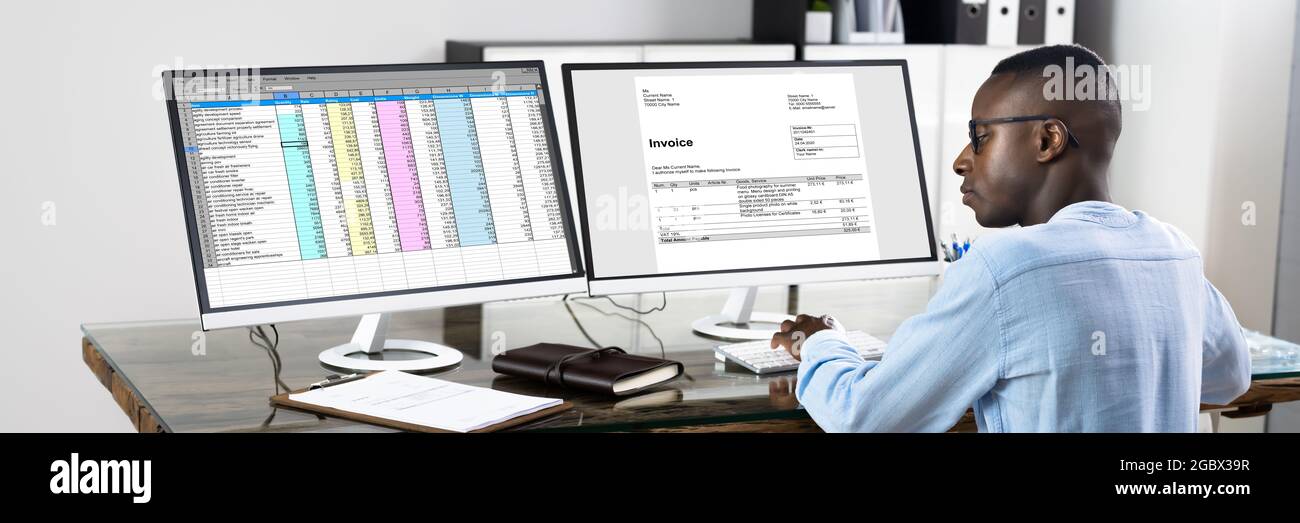 Tax Account Invoice Spreadsheet Report On Computer Monitor Stock Photo