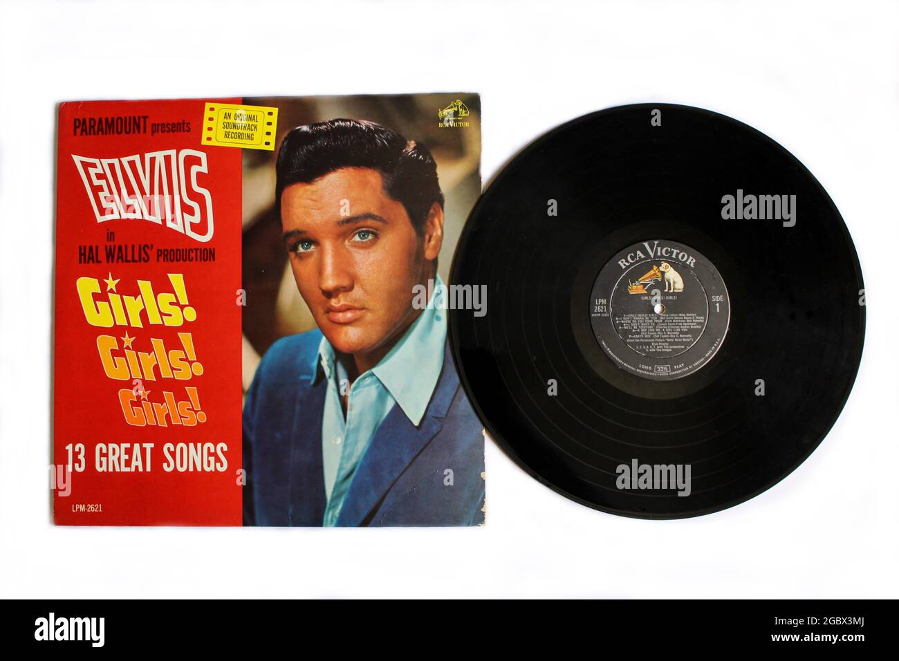 Rock and Gospel artist Elvis film music album on vinyl record LP disc. Girls! Girls! Girls! is a soundtrack album by American singer Elvis Presley Stock Photo