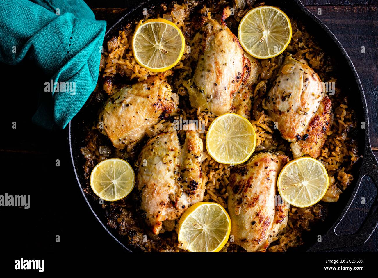 Greek Chicken and Lemon Rice Served in a Cast Iron Skillet Boneless