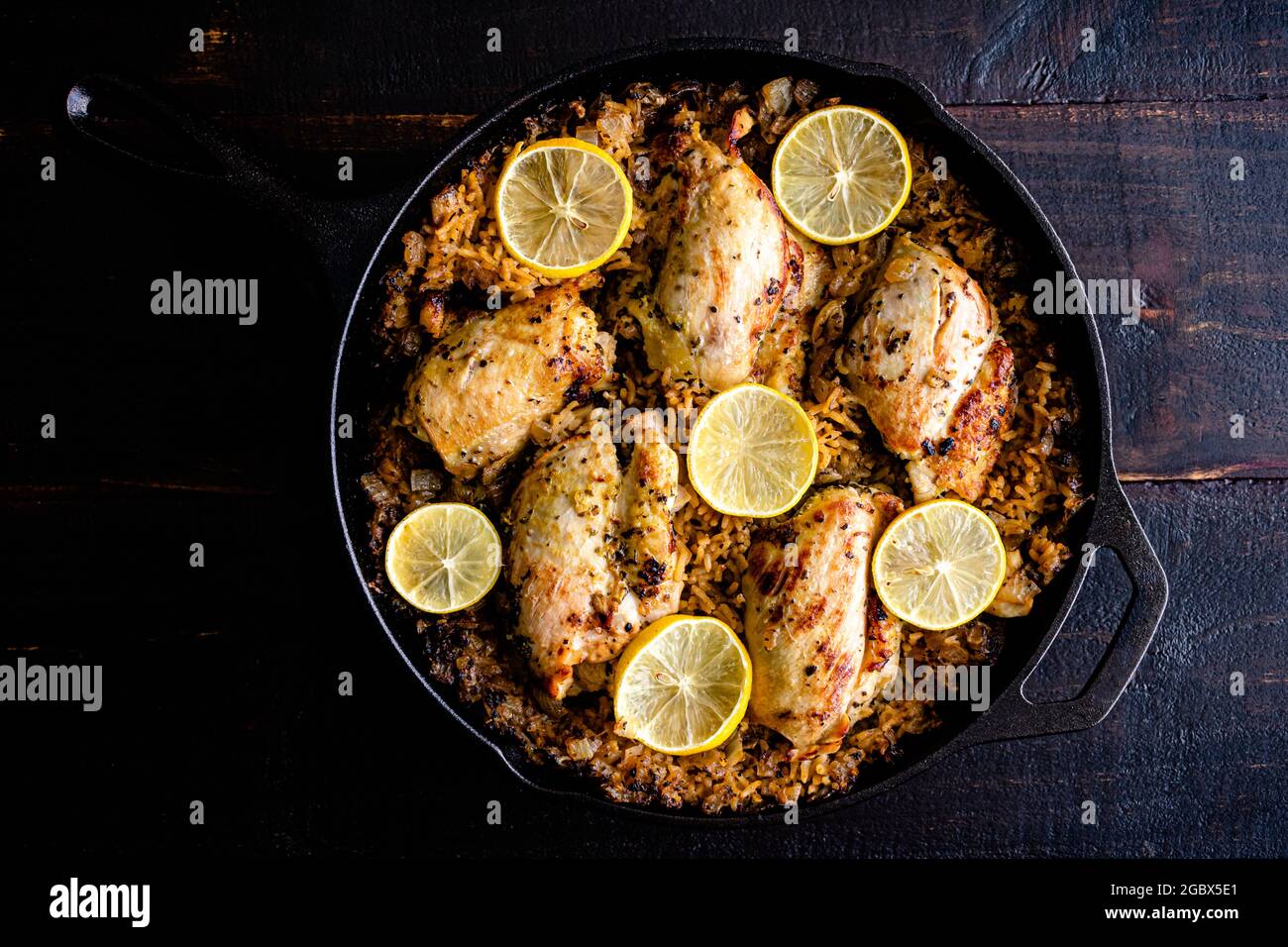 Greek Chicken and Lemon Rice Served in a Cast Iron Skillet Boneless